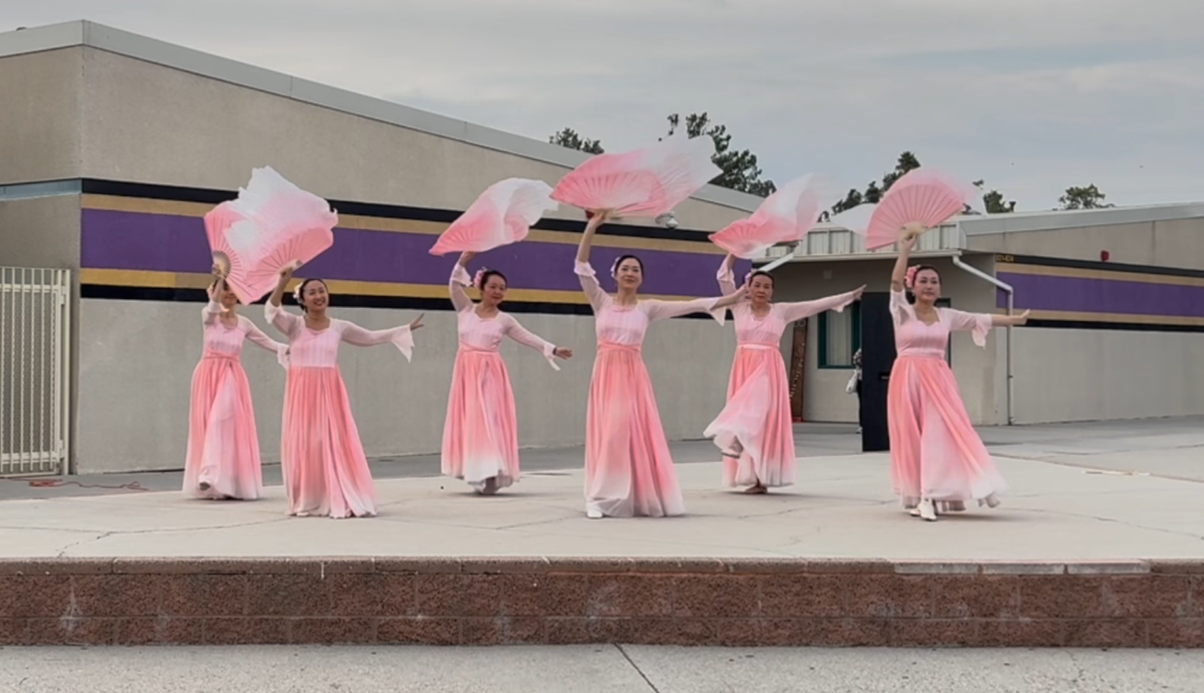 scv chinese dance dancing with long silk fans above their heads