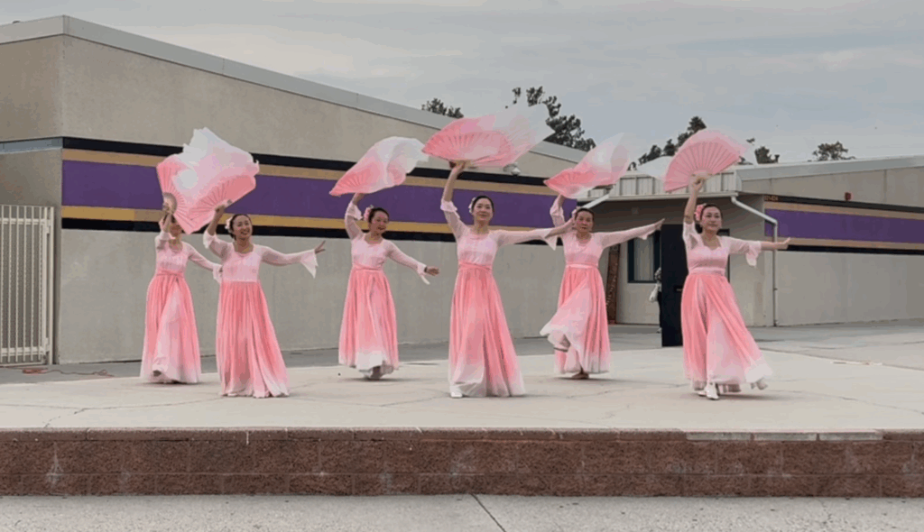 scv chinese dance dancing with long silk fans above their heads