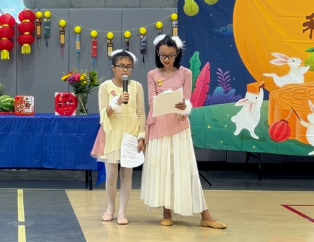 Cora and Amy narrating Chang’e and the White Rabbit
